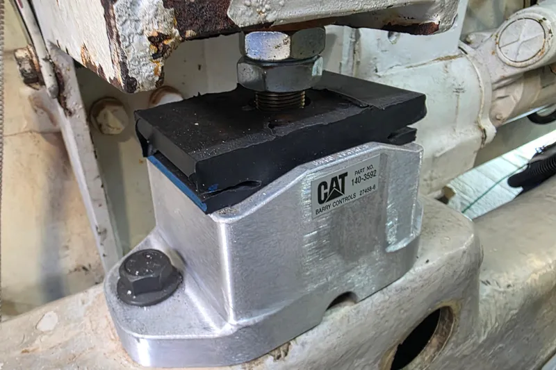 Slide: The Image of Engine mount detail on a 2002 Sea Ray 560 Sedan Bridge, featuring CAT Barry Controls. - 158