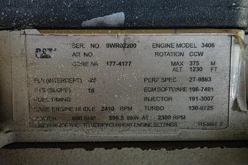 Slide: The Image of Engine specification plate for 2002 Sea Ray 560 Sedan Bridge, featuring CAT model 3406. - 160