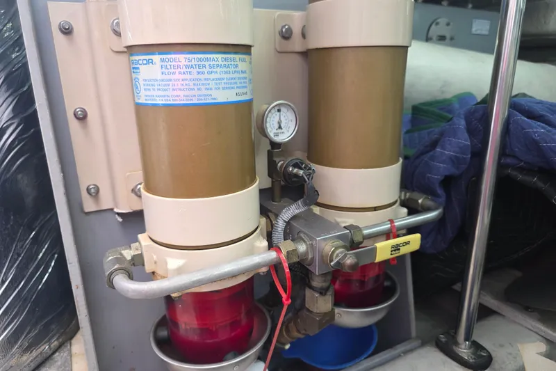 Slide: The Image of Diesel fuel filter system on a 2002 Sea Ray 560 Sedan Bridge yacht. - 165