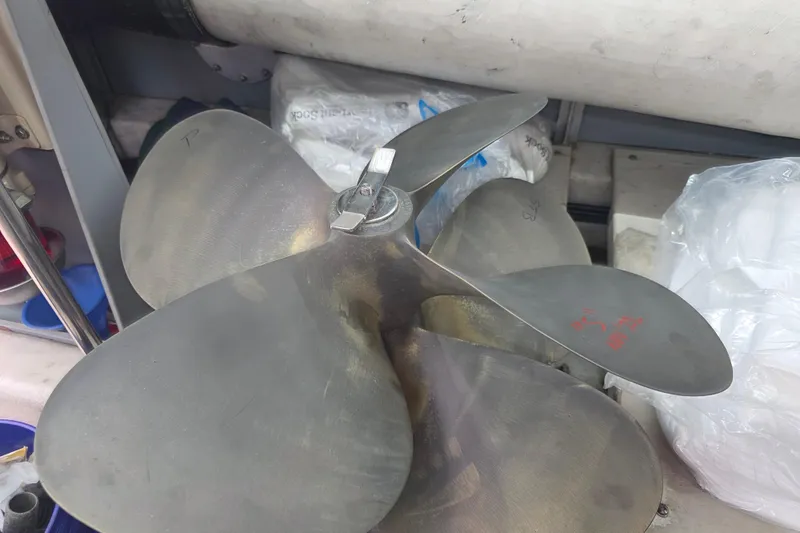 Slide: The Image of Propeller of a 2002 Sea Ray 560 Sedan Bridge, displayed in a storage area. - 168