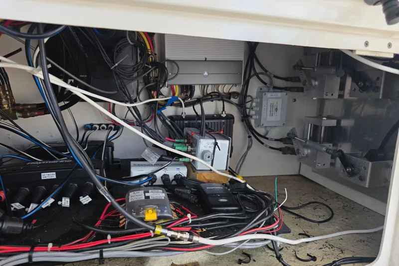 Slide: The Image of Electrical wiring and components inside a 2002 Sea Ray 560 Sedan Bridge yacht. - 64