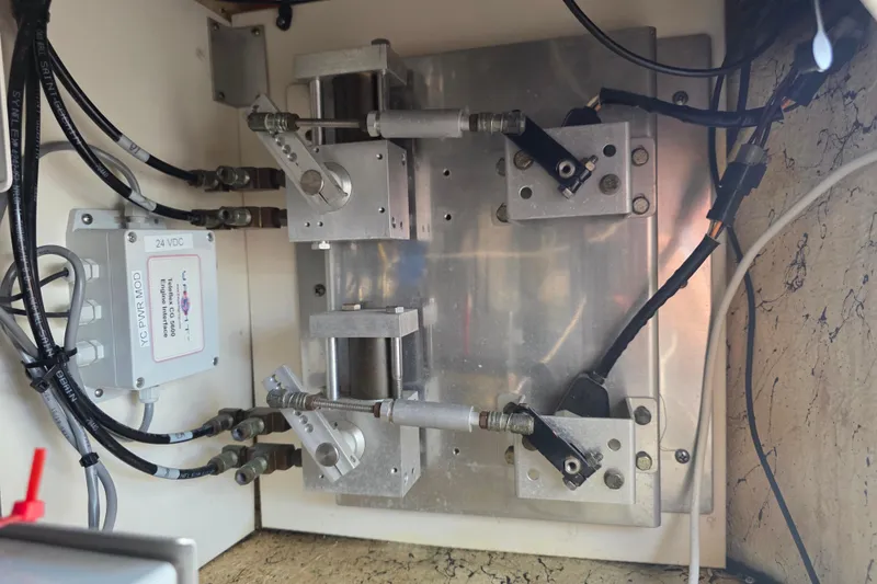 Slide: The Image of Engine control system of a 2002 Sea Ray 560 Sedan Bridge yacht, featuring wiring and components. - 67
