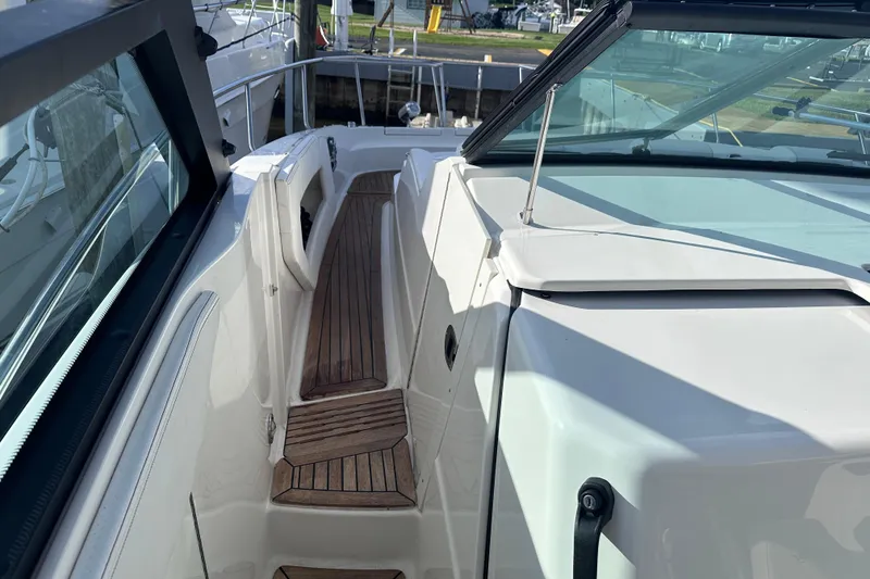 Slide: The Image of 2020 Sea Ray Sundancer 320 Coupe with sleek deck and modern design. - 20