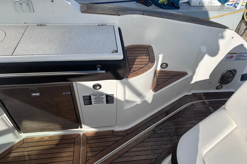 Slide: The Image of Manufacturer Provided Image: Luxurious interior cabin of 2020 Sea Ray Sundancer 320 Coupe with cozy bedding and modern amenities. - 38