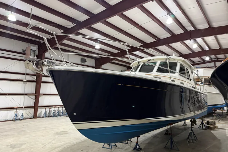 Slide: The Image of 2017 Sabre 38 Salon Express yacht in storage facility, side view. - 18