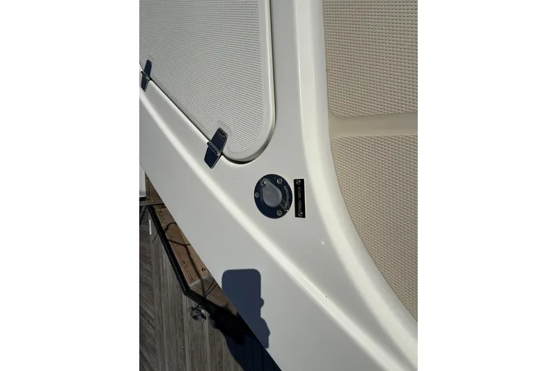 Slide: The Image of 2017 Sabre 38 Salon Express boat detail with textured panel and hardware. - 29