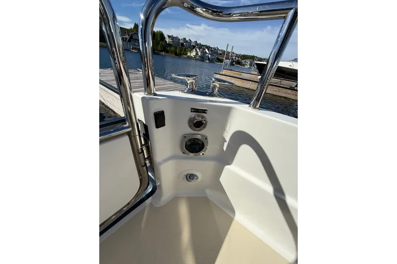 Slide: The Image of 2017 Sabre 38 Salon Express boat deck with chrome railings and dock view. - 31