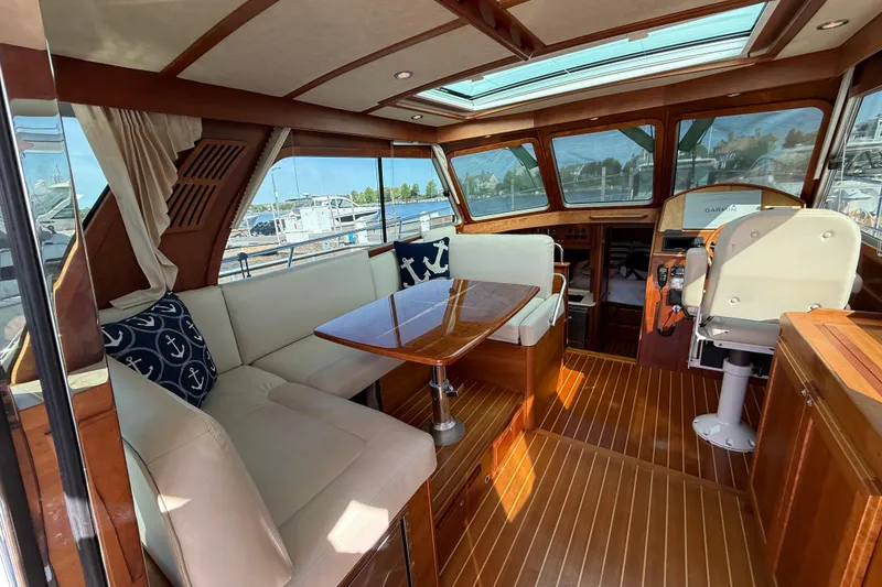 Slide: The Image of Luxurious interior of 2017 Sabre 38 Salon Express yacht with elegant seating and wood finishes. - 34