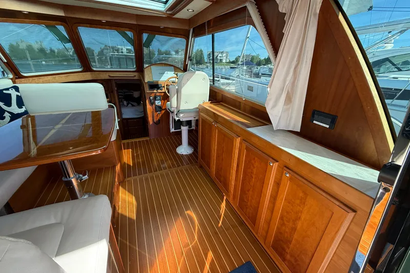 Slide: The Image of Interior of 2017 Sabre 38 Salon Express yacht with elegant wood finish and seating area. - 35