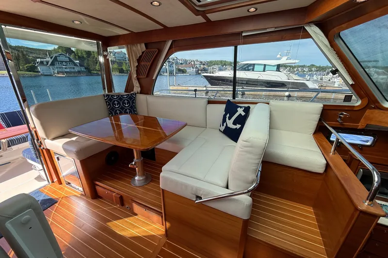Slide: The Image of Luxurious interior of 2017 Sabre 38 Salon Express yacht with elegant seating and waterfront view. - 40