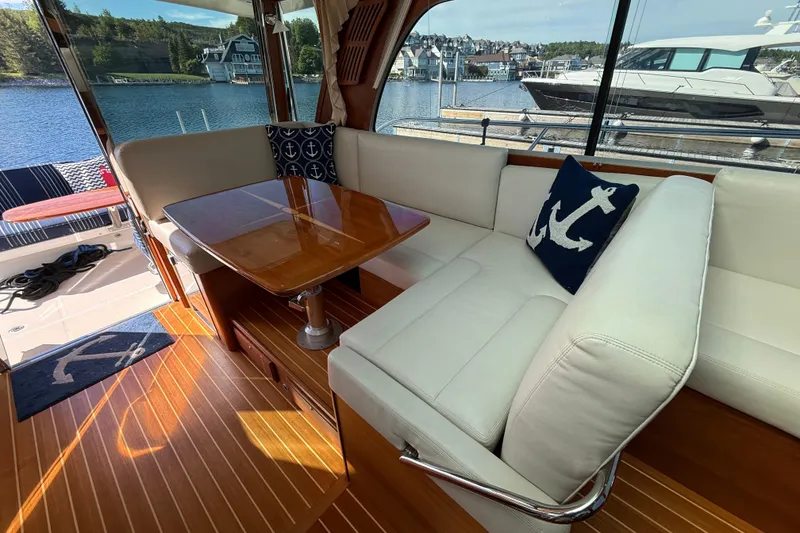 Slide: The Image of Interior of 2017 Sabre 38 Salon Express yacht with elegant seating and nautical decor. - 41