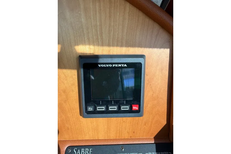 Slide: The Image of Volvo Penta control panel on 2017 Sabre 38 Salon Express yacht dashboard. - 45