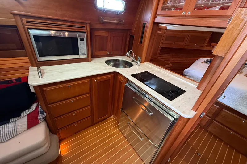 Slide: The Image of Luxurious 2017 Sabre 38 Salon Express yacht interior with modern kitchen amenities. - 59