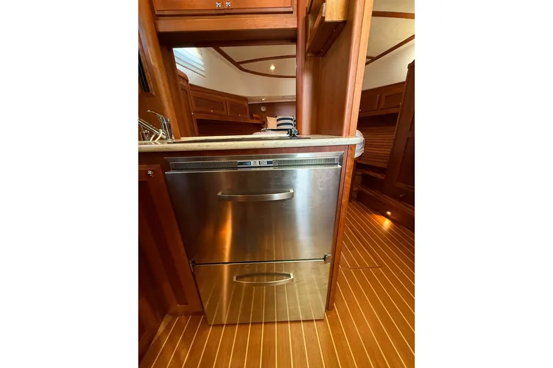 Slide: The Image of 2017 Sabre 38 Salon Express interior with stainless steel drawer fridge. - 65