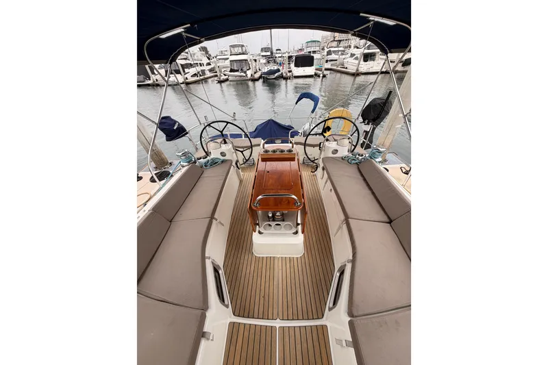 Slide: The Image of Cockpit view of 2014 Jeanneau Sun Odyssey 50 DS yacht in marina. - 26