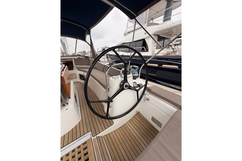 Slide: The Image of Cockpit of 2014 Jeanneau Sun Odyssey 50 DS sailboat with steering wheel and seating. - 30