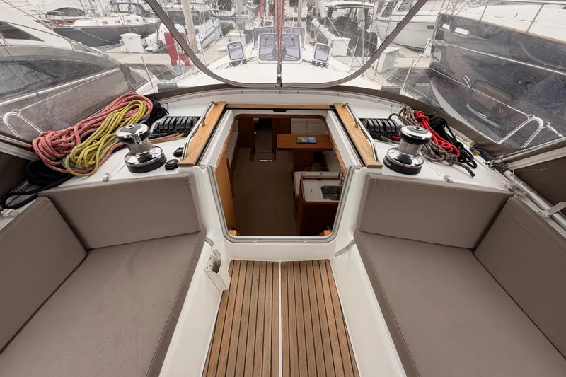 Slide: The Image of Interior view of 2014 Jeanneau Sun Odyssey 50 DS sailboat cockpit with seating and winches. - 38