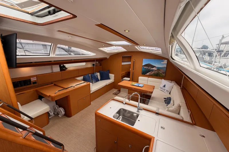Slide: The Image of Luxurious interior of 2014 Jeanneau Sun Odyssey 50 DS yacht with modern amenities. - 49