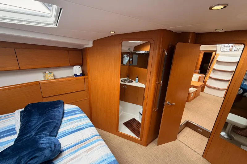 Slide: The Image of Luxurious interior of 2014 Jeanneau Sun Odyssey 50 DS yacht with cozy bedroom and bathroom. - 62