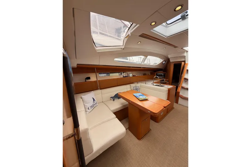 Slide: The Image of Interior of 2014 Jeanneau Sun Odyssey 50 DS yacht with elegant seating and skylights. - 69