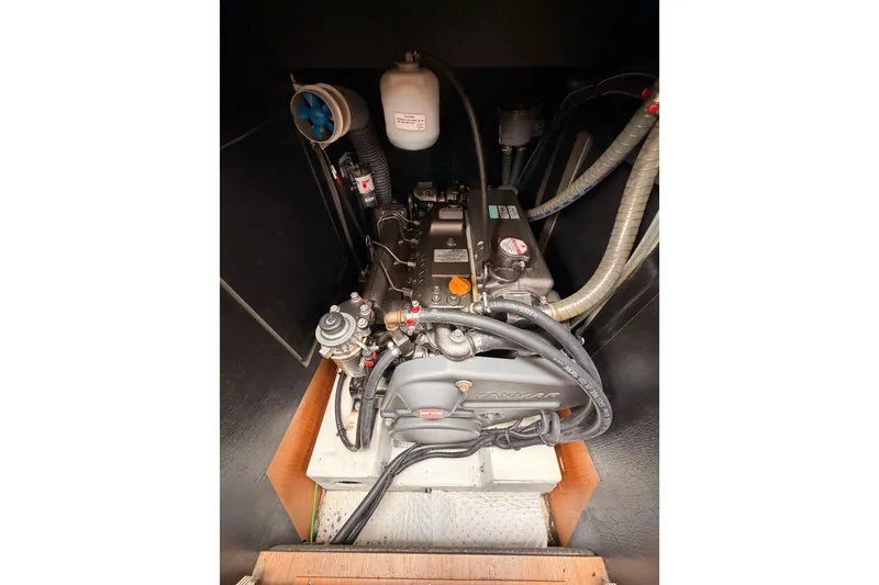 Slide: The Image of Engine compartment of 2014 Jeanneau Sun Odyssey 50 DS sailboat, showcasing mechanical components. - 72