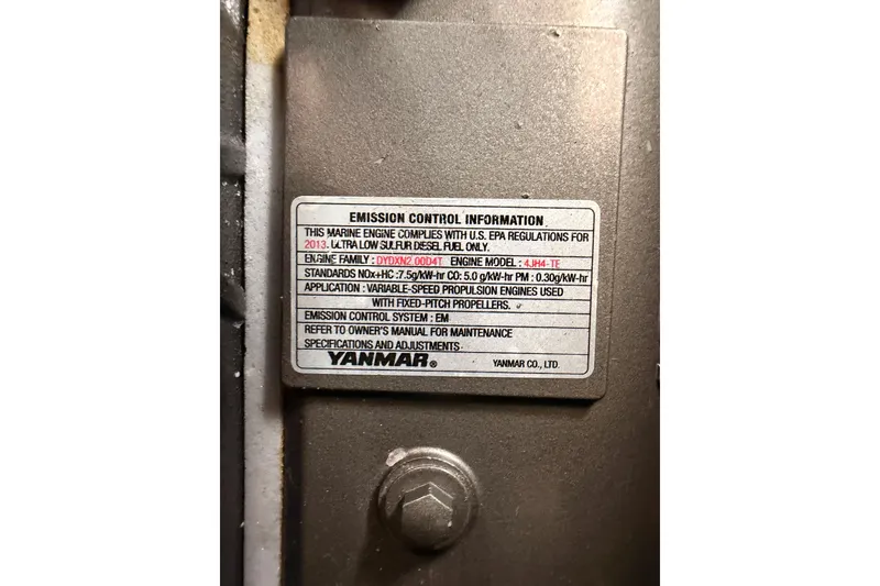 Slide: The Image of Emission control label on Yanmar engine for Jeanneau Sun Odyssey 50 DS, 2014 model. - 73