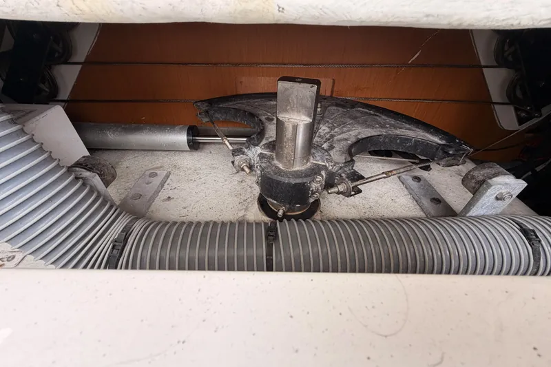 Slide: The Image of Engine compartment of a 2014 Jeanneau Sun Odyssey 50 DS sailboat, showing mechanical components. - 83