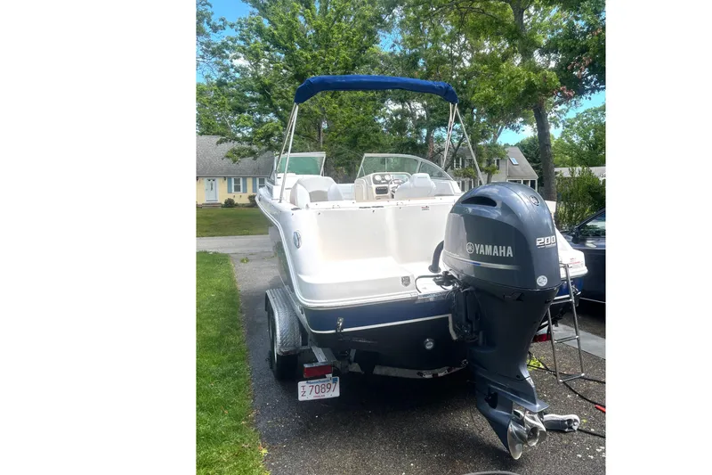 Slide: The Image of 2016 Robalo R227 Dual Console boat with Yamaha 200 engine on a trailer. - 5