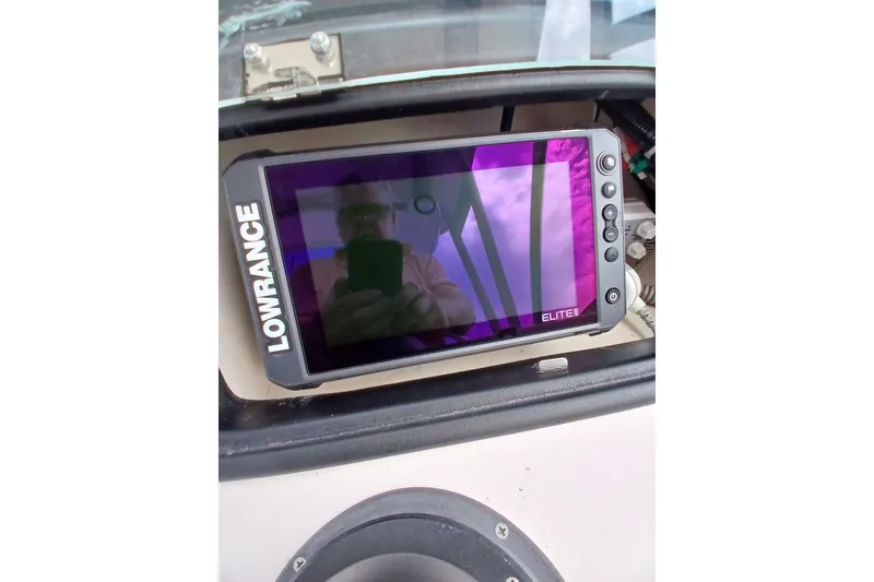 Slide: The Image of Lowrance Elite fishfinder on 1996 Grady-White Advance 247 boat dashboard. - 25