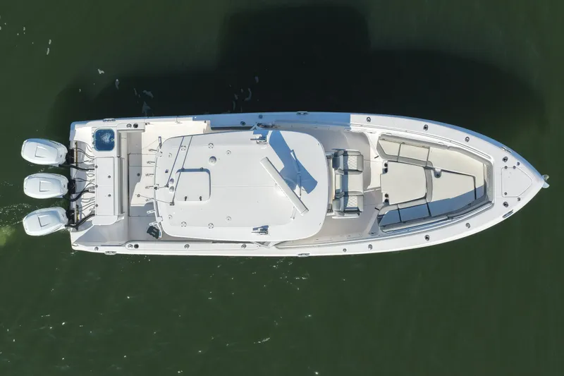 Slide: The Image of Overhead view of 2022 Everglades 365 Center Console boat on water. - 17