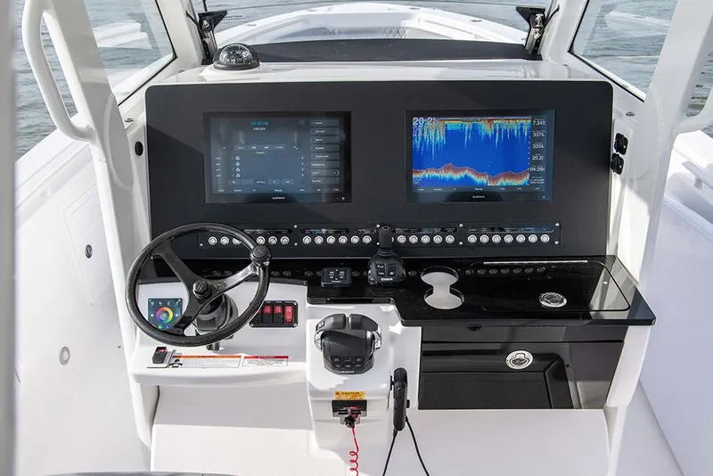 Slide: The Image of Manufacturer Provided Image: 2022 Everglades 365 Center Console helm with dual displays and advanced navigation controls. - 19