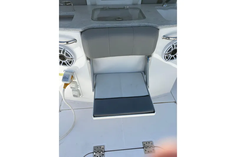 Slide: The Image of 2022 Everglades 365 Center Console boat interior with seating and speaker system. - 24