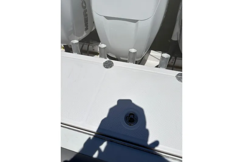 Slide: The Image of 2022 Everglades 365 Center Console boat deck with engine and shadow. - 28