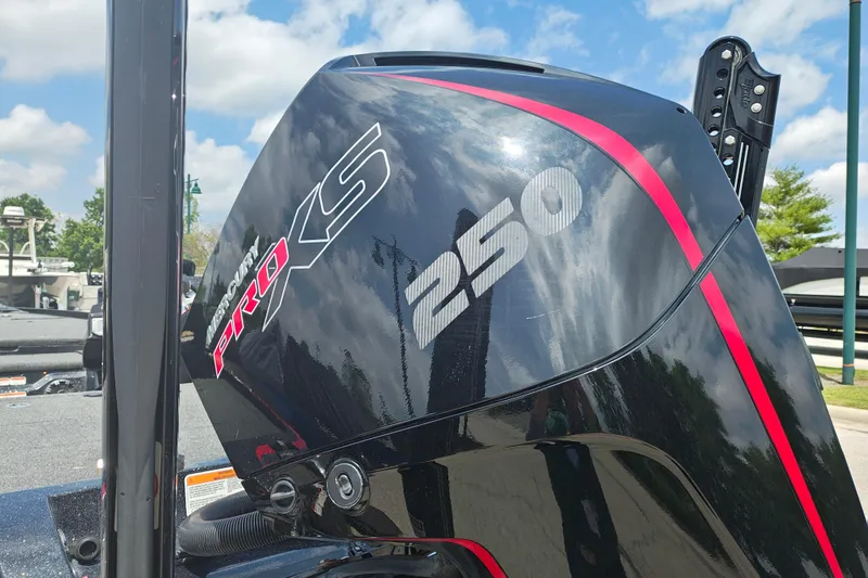 Slide: The Image of Mercury Pro XS 250 engine on 2022 Nitro Z21 XL Pro boat, outdoors. - 12