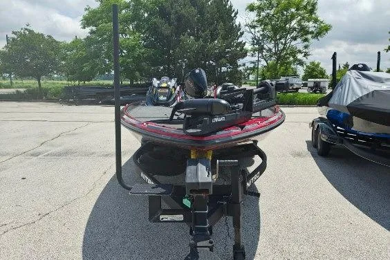 Slide: The Image of 2022 Nitro Z21 XL Pro boat on trailer in outdoor setting. - 2