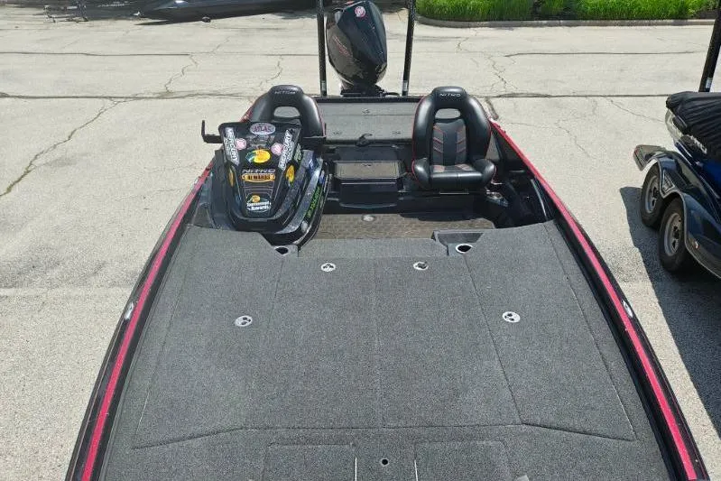 Slide: The Image of 2022 Nitro Z21 XL Pro fishing boat with spacious deck and dual seats. - 3