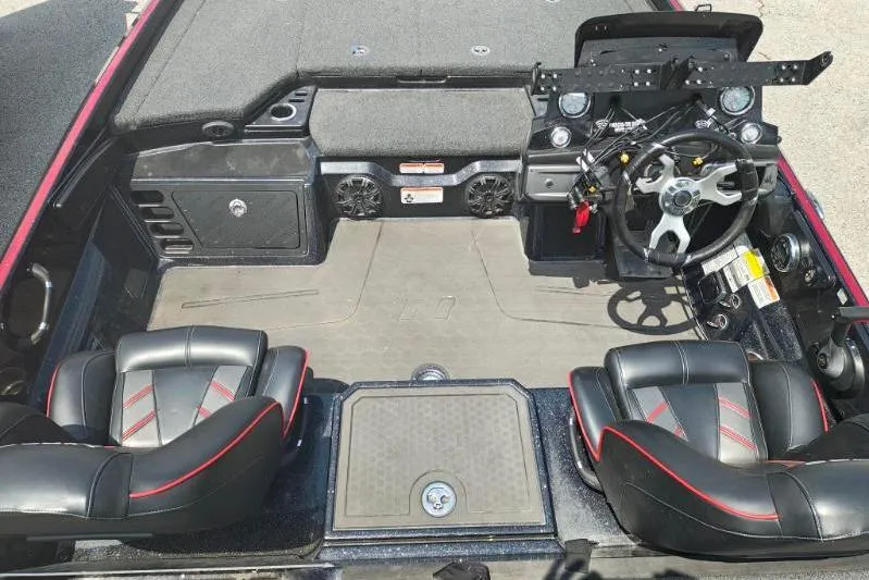 Slide: The Image of 2022 Nitro Z21 XL Pro boat interior with dual seats and steering console. - 7