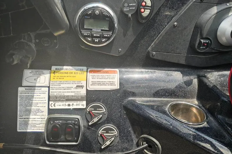 Slide: The Image of Control panel of a 2022 Nitro Z21 XL Pro boat with gauges and switches. - 9