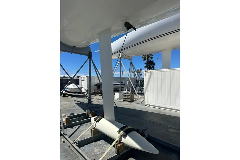 Slide: The Image of Sailboat keel of 2018 Botin 56 model in a shipyard setting. - 11