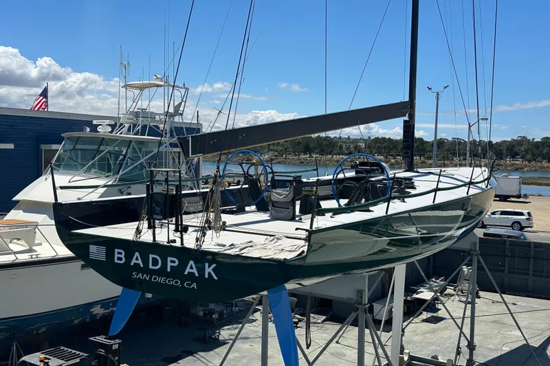 Slide: The Image of Sleek 2018 Botin 56 sailboat "Badpak" docked in San Diego, CA, with clear skies. - 16