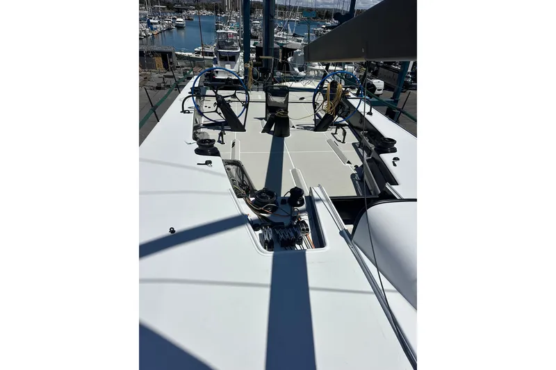 Slide: The Image of Sailing yacht Botin 56, 2018 model, docked at marina with clear deck view. - 23