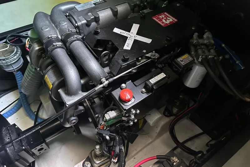 Slide: The Image of Engine compartment of a 2018 Botin 56, featuring a Yanmar 2-3 diesel engine. - 28