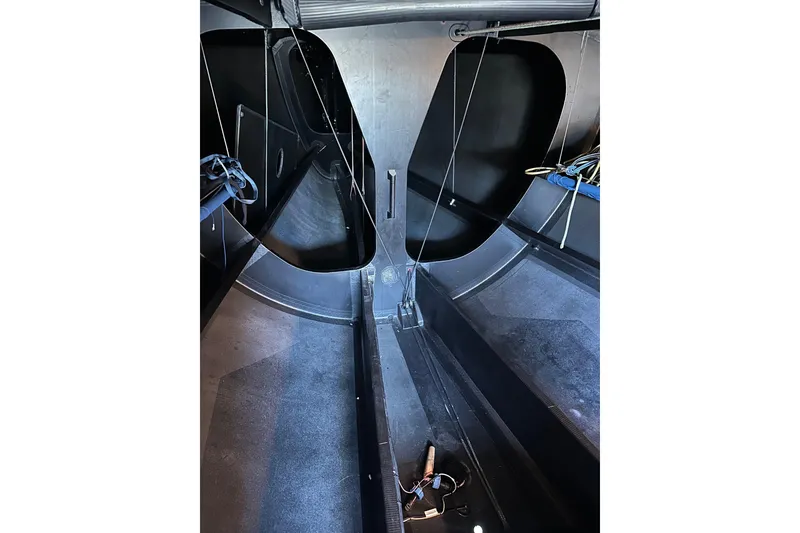 Slide: The Image of Interior view of a 2018 Botin 56 sailboat, showcasing sleek design and rigging details. - 31