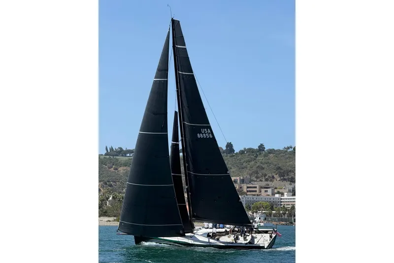 Slide: The Image of Sleek 2018 Botin 56 sailboat with black sails on a sunny day. - 36