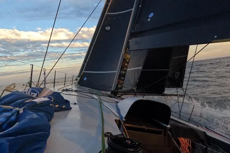 Slide: The Image of Sailing on Botin 56 yacht, 2018 model, with ocean view and dramatic sky. - 4