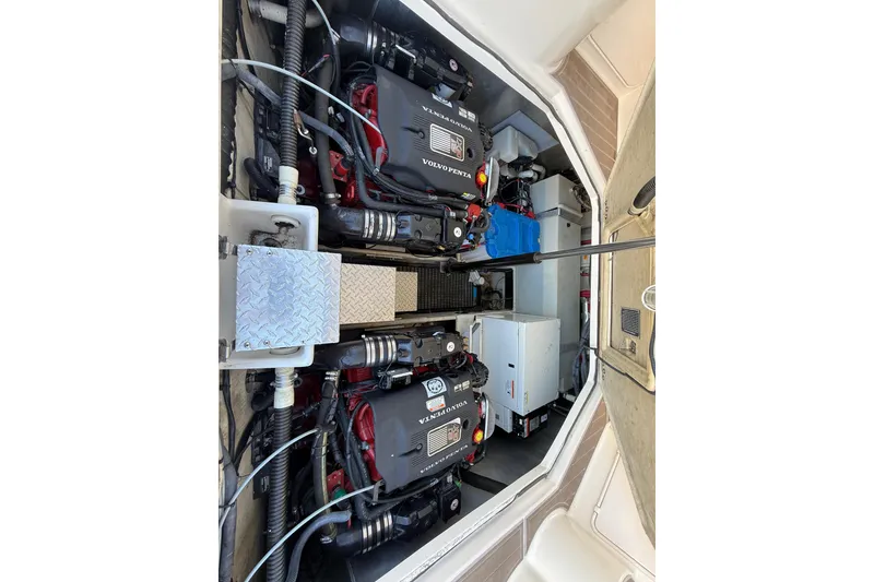 Slide: The Image of Engine compartment of 2005 Regal Commodore 3560 IO with dual Volvo Penta engines. - 80