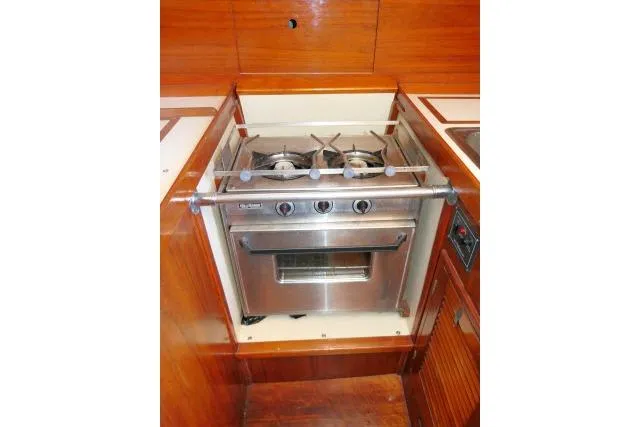 Slide: The Image of Stainless steel stove and oven in 1978 Tartan 37 yacht galley. - 17