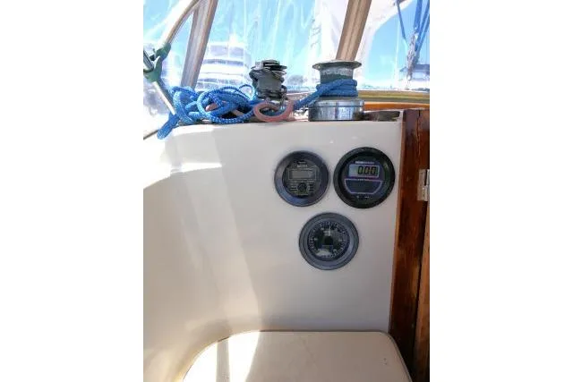 Slide: The Image of Cockpit of 1978 Tartan 37 sailboat with gauges and winch. - 33