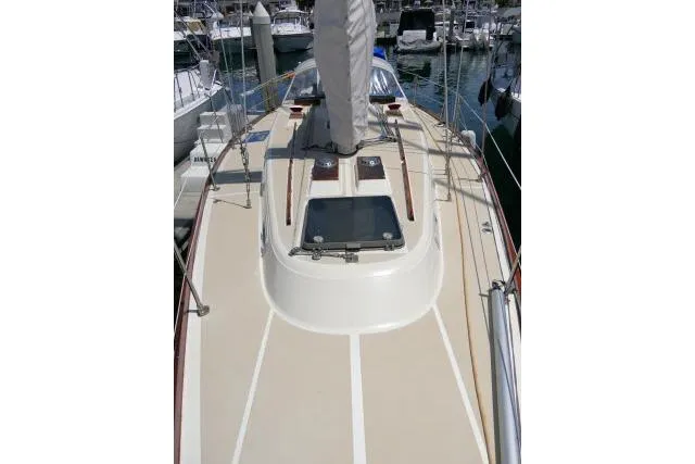 Slide: The Image of 1978 Tartan 37 sailboat deck view in marina setting. - 44