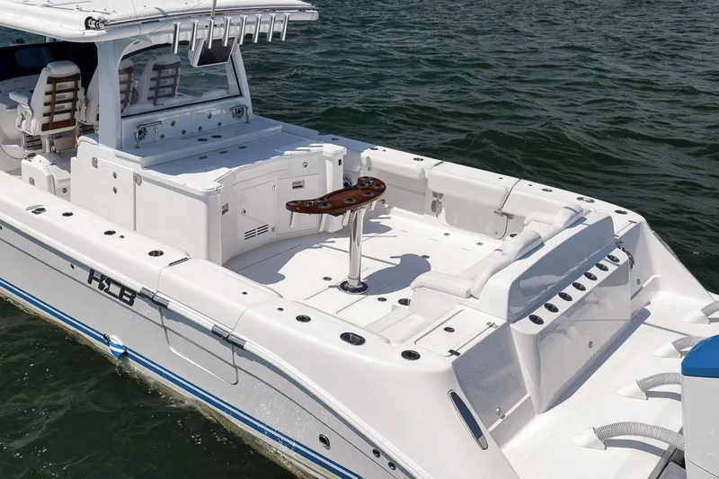 Slide: The Image of HCB 53 Suenos 2023 boat on calm water. - 12